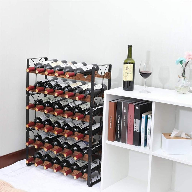 black metal wine rack next to the bookshelf